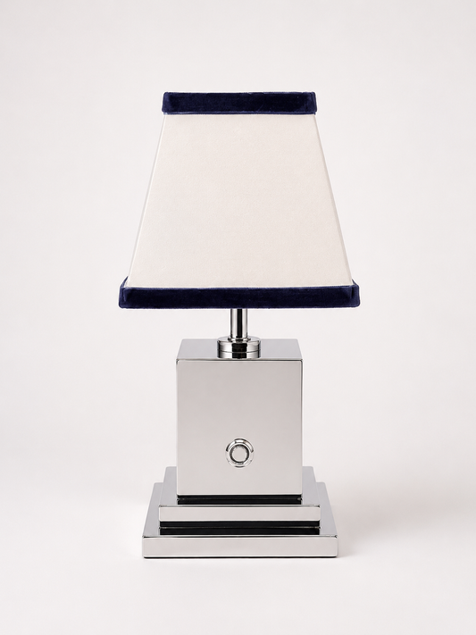 Chrome rechargeable table lamp with white linen and navy blue velvet shade