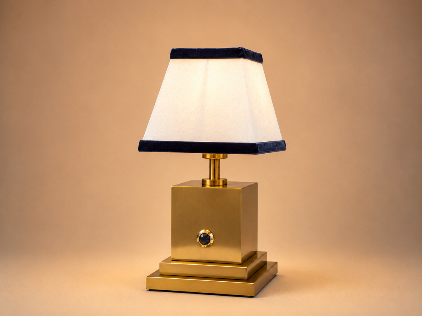 Brushed brass rechargeable table lamp with white linen and navy blue velvet shade