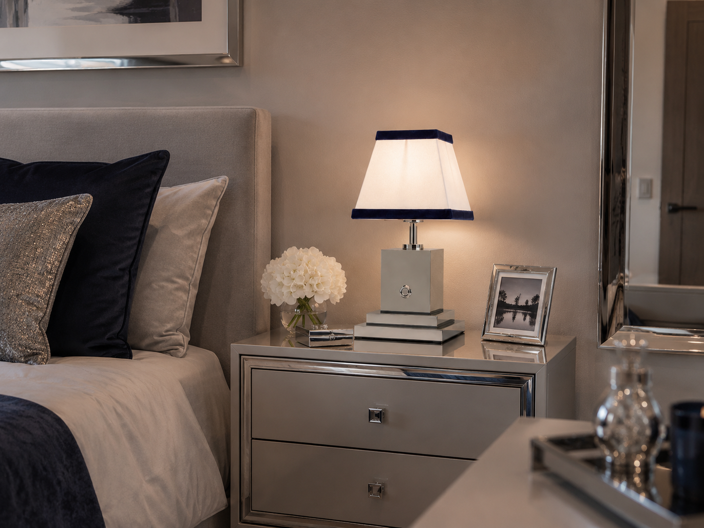 Chrome rechargeable table lamp with white linen and navy blue velvet shade