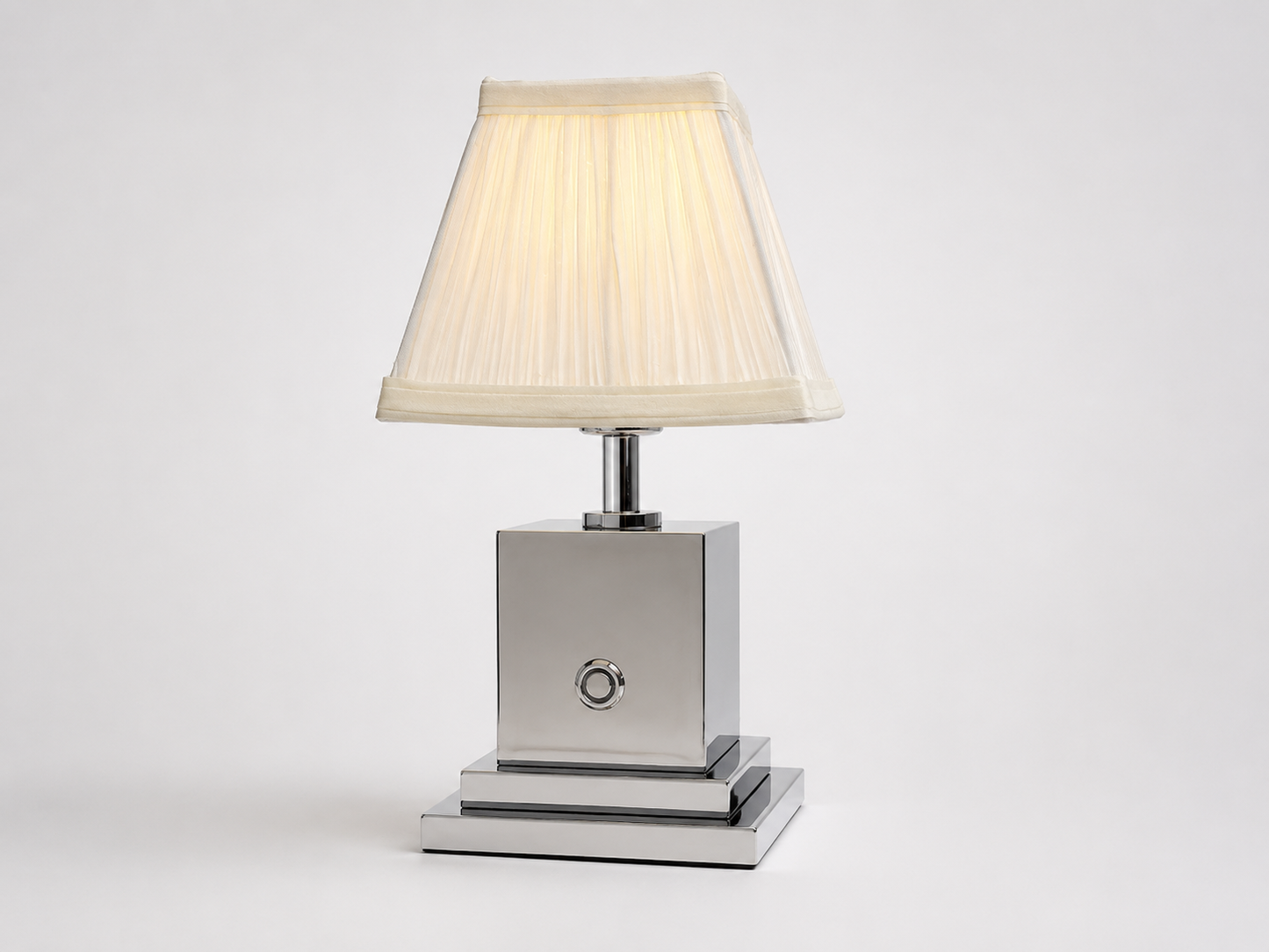 Chrome rechargeable table lamp with ivory pleated shade